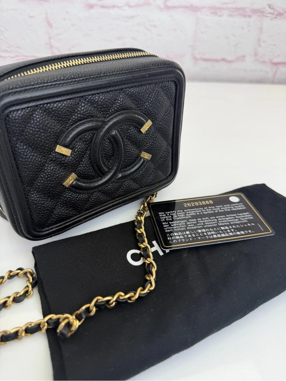 CHANEL Caviar Quilted CC Filigree Vanity Clutch With Chain Black
